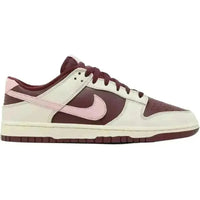 Nike Dunk Low Valentine's Day 2023 sneaker with burgundy and sail leather upper and a tumbled pink leather Swoosh.
