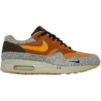 Nike Air Max 1 Atmos Safari 2016 sneaker in flax, kumquat, and chestnut suede with iconic safari print overlays.