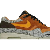 Nike Air Max 1 Atmos Safari 2016 featuring flax suede, kumquat orange swoosh, and iconic grey animal print overlays.