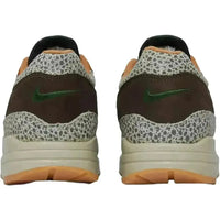 Rear view of Nike Air Max 1 Atmos Safari 2016 sneakers featuring flax suede, brown panels, and signature safari print.