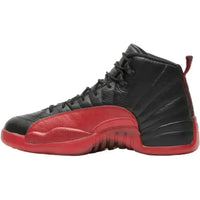 Jordan 12 Retro Flu Game 2016 sneaker in black tumbled leather with a varsity red mudguard and outsole.