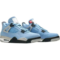 Jordan 4 Retro University Blue sneakers in suede with speckled cement grey accents, black detailing, and a visible air unit.