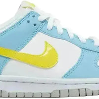 Nike Dunk Low Next Nature GS in white leather with light blue overlays, a yellow Swoosh, and a grey rubber outsole.